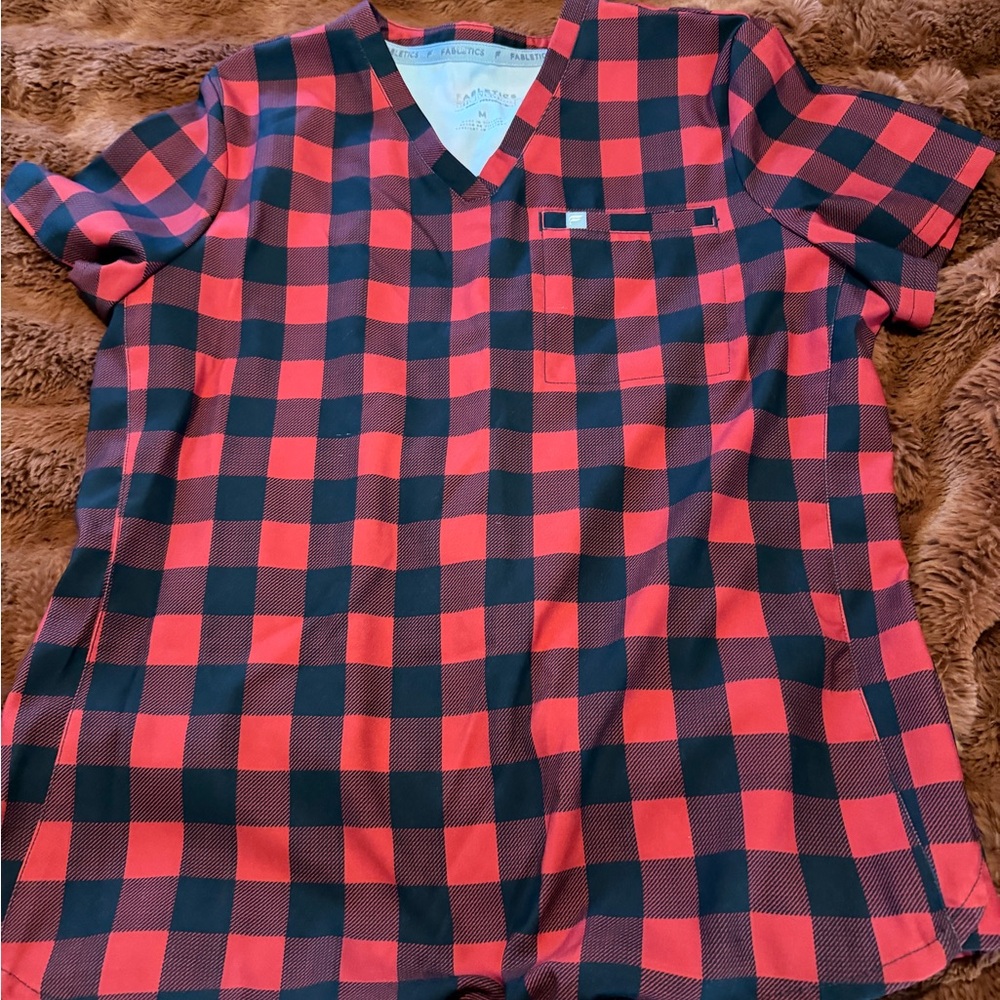 Fabletics Red and Black Buffalo Plaid V-Neck Scrub top with some wear.